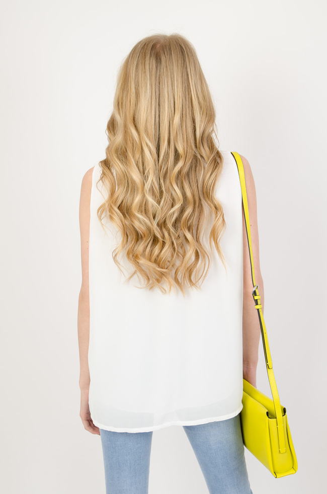 Biała elegancka bluzka z wiązaniem