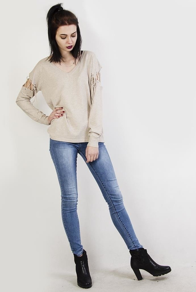 Beżowy sweterek z wiązaniami przy ramionach