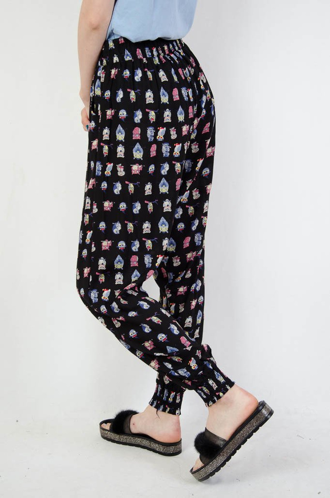 Czarne spodnie alladynki w sowy