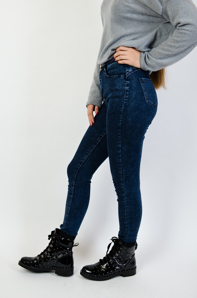 Spodnie skinny z wysokim stanem oraz falbaną w pasie 