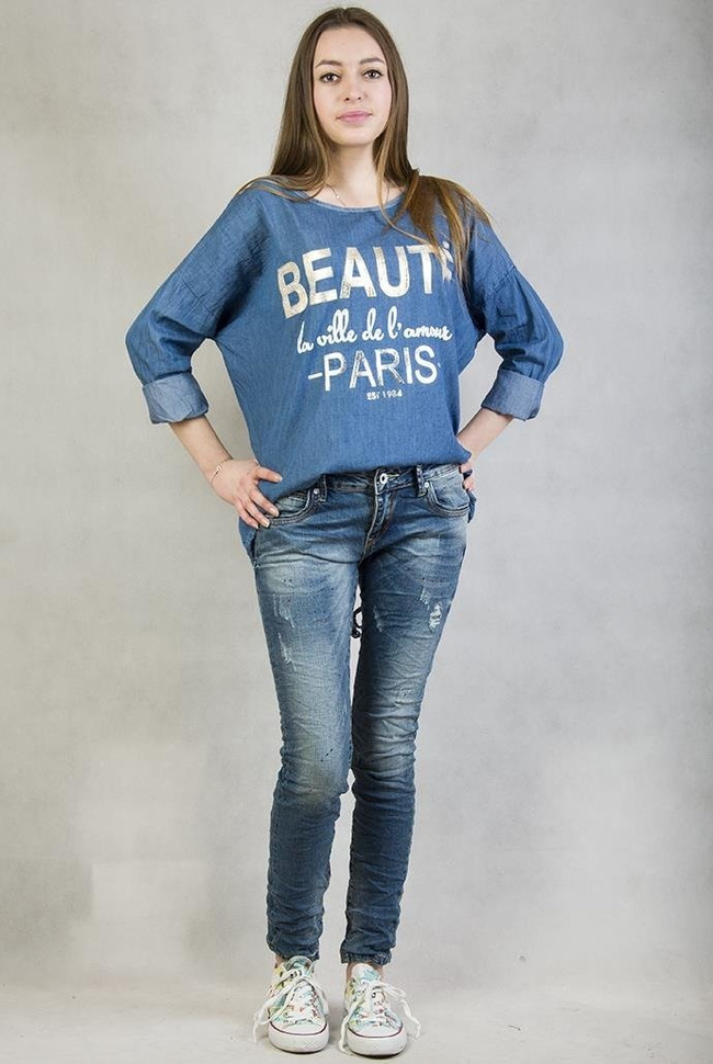 Jasno niebieska, asymetryczna bluzka jeansowa