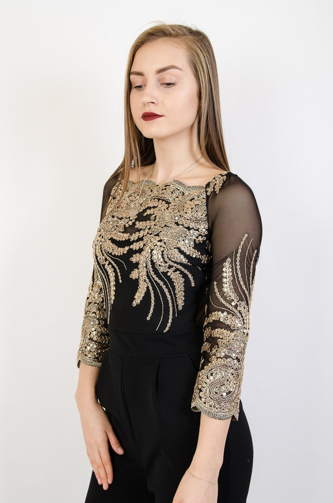 Czarny elegancki kombinezon ze złotymi cekinami
