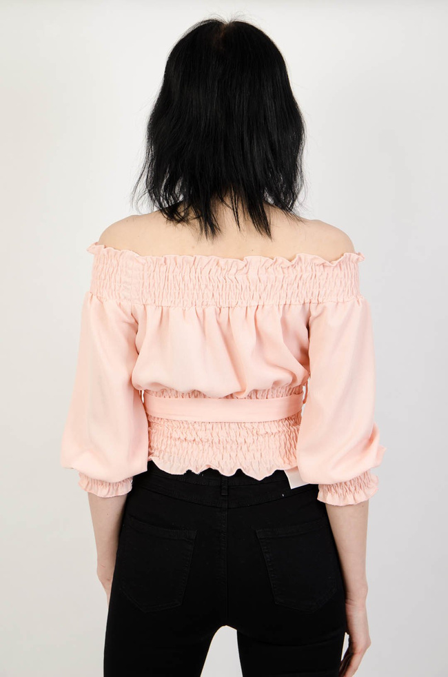 Różowy crop top z kokardą