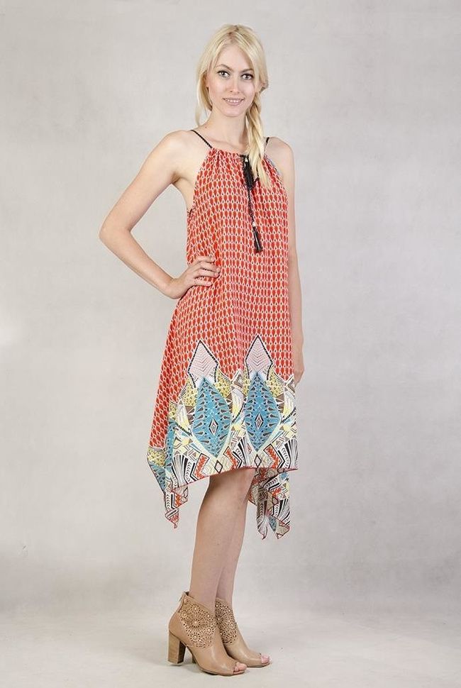 Wzorzysta sukienka z dłuższymi bokami pomarańczowa