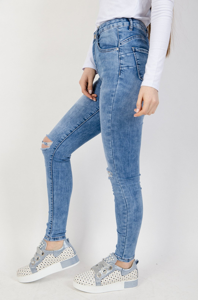 Jasne spodnie jeansowe z rozcięciami na kolanach typu Push-Up