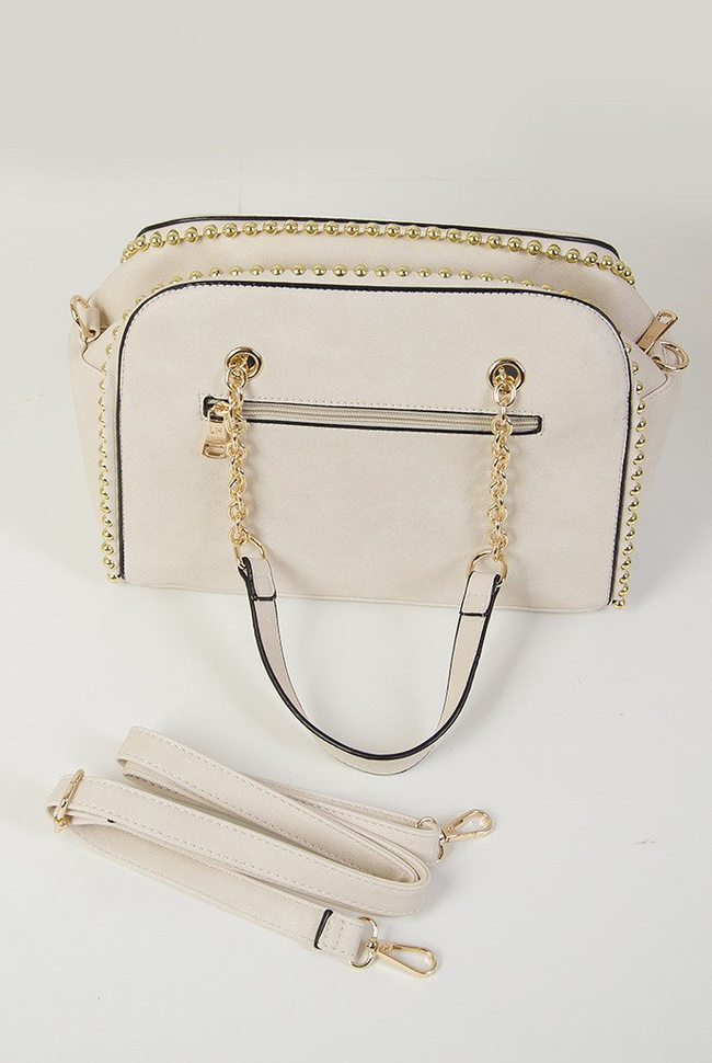 Beżowa torebka typu kuferek ze złotymi ćwiekami