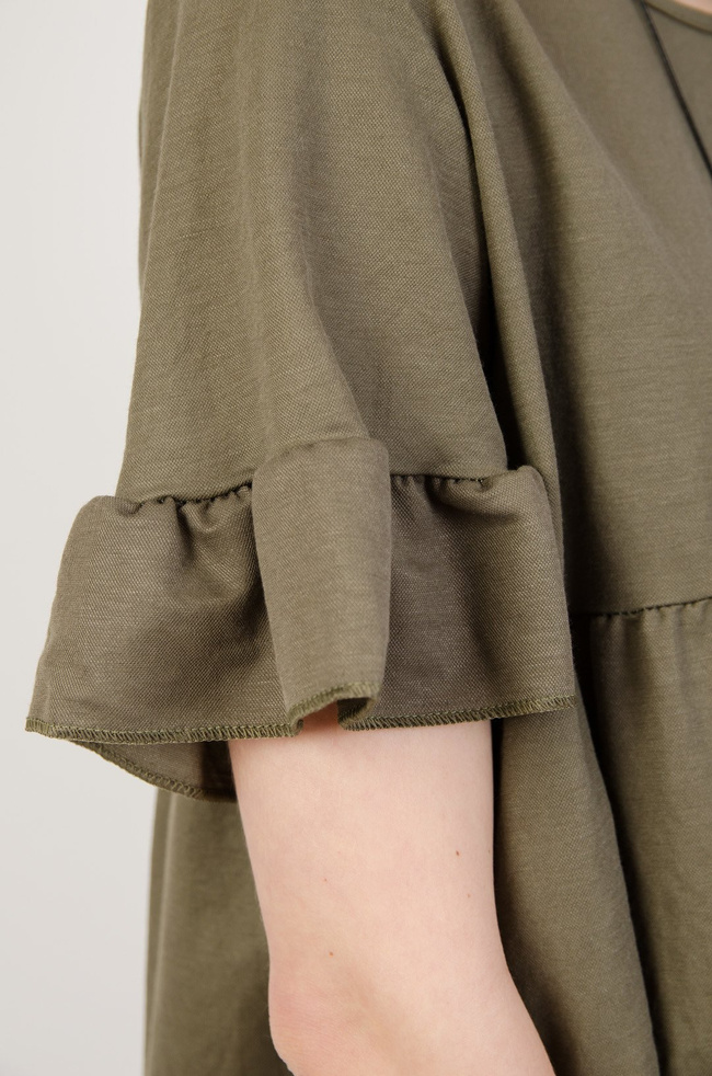 Zielona bluzka z rozkloszowanym dołem 