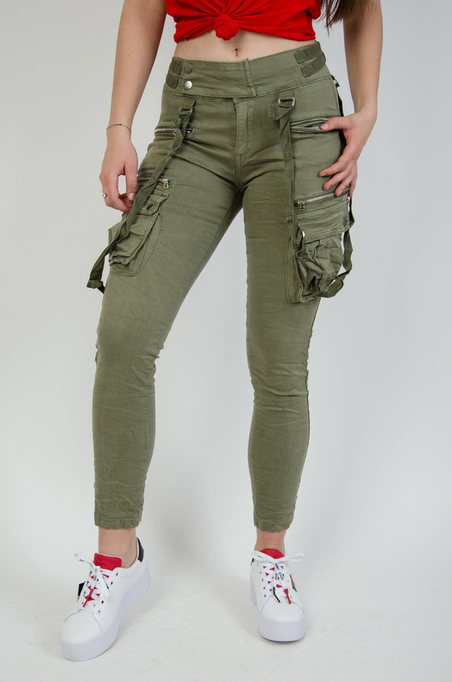 Jasno zielone spodnie joggery z zamkami oraz szelkami