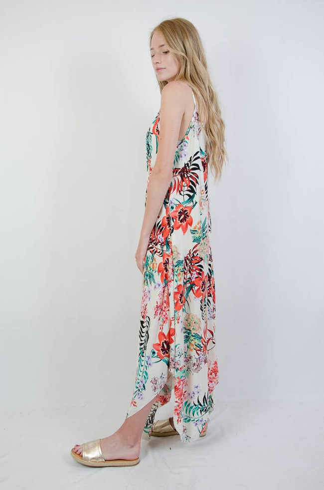 KREMOWA ASYMETRYCZNA SUKIENKA W KWIATY Z DEKOLTEM W SEREK 