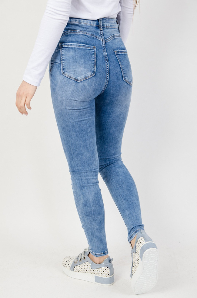 Jasne spodnie jeansowe z rozcięciami na kolanach typu Push-Up