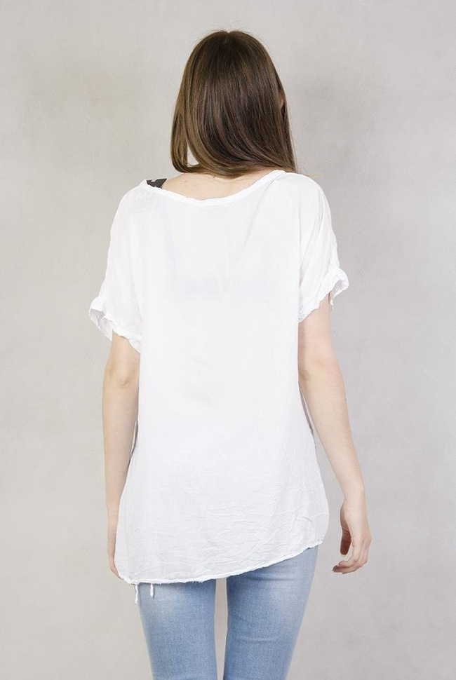 Bluzka z sercem z cekinów i frędzelków