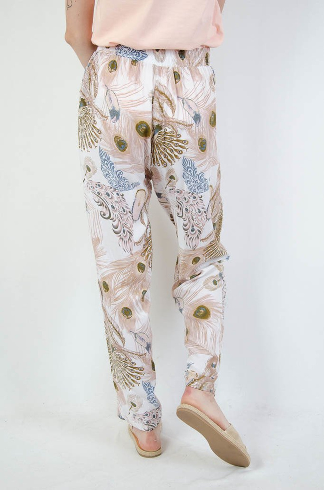 Białe spodnie alladynki z motywem pawiego oka