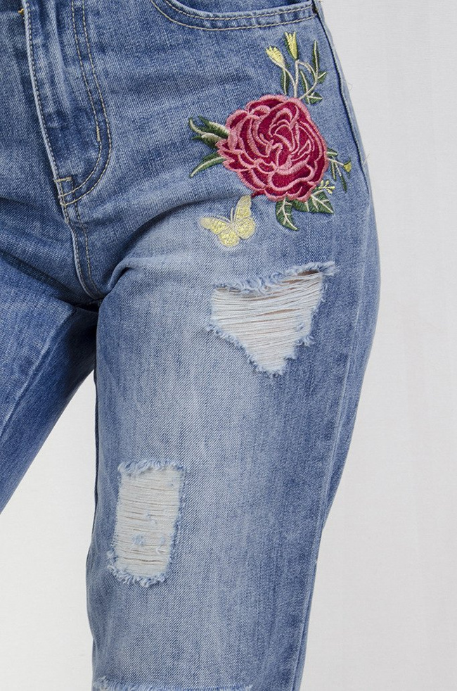 Spodnie jeansowe typu boyfriend z różami