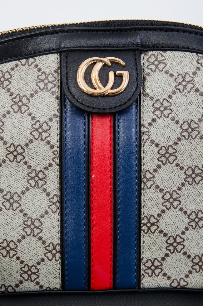 Wzorzysta torebka z czerwono-granatowym paskiem na przodzie