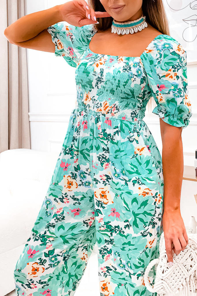 KOMBINEZON W KWIATY Z DOPASOWANA GÓRĄ I BUFIASTYMI RĘKAWAMI- ZIELONY