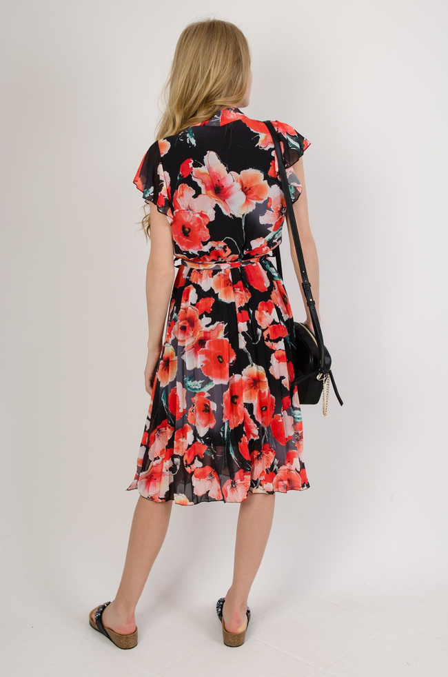 Czarna sukienka w maki z plisowanym dołem