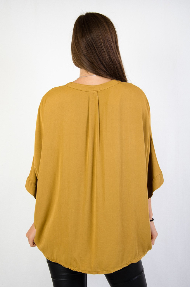 Żółta bluzka nietoperz z przedłużanym tyłem