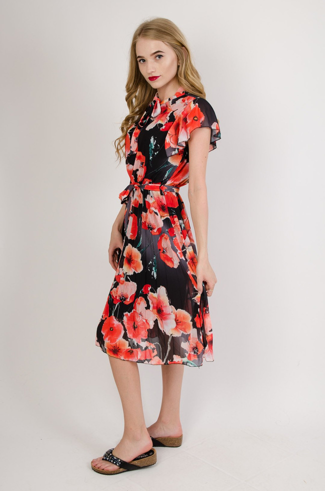 Czarna sukienka w maki z plisowanym dołem