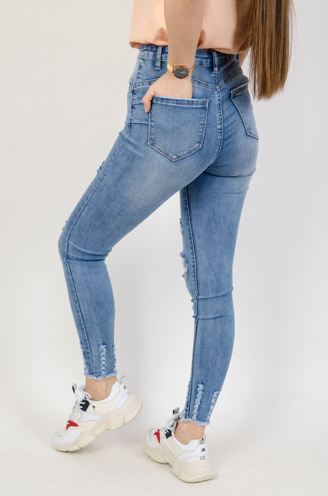 Jasne spodnie jeansowe Push up z przetarciami