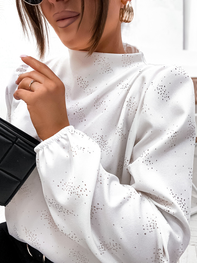 BLUZKA Z BUFIASTYMI RĘKAWAMI I BŁYSZCZĄCYM WZOREM- BIAŁA