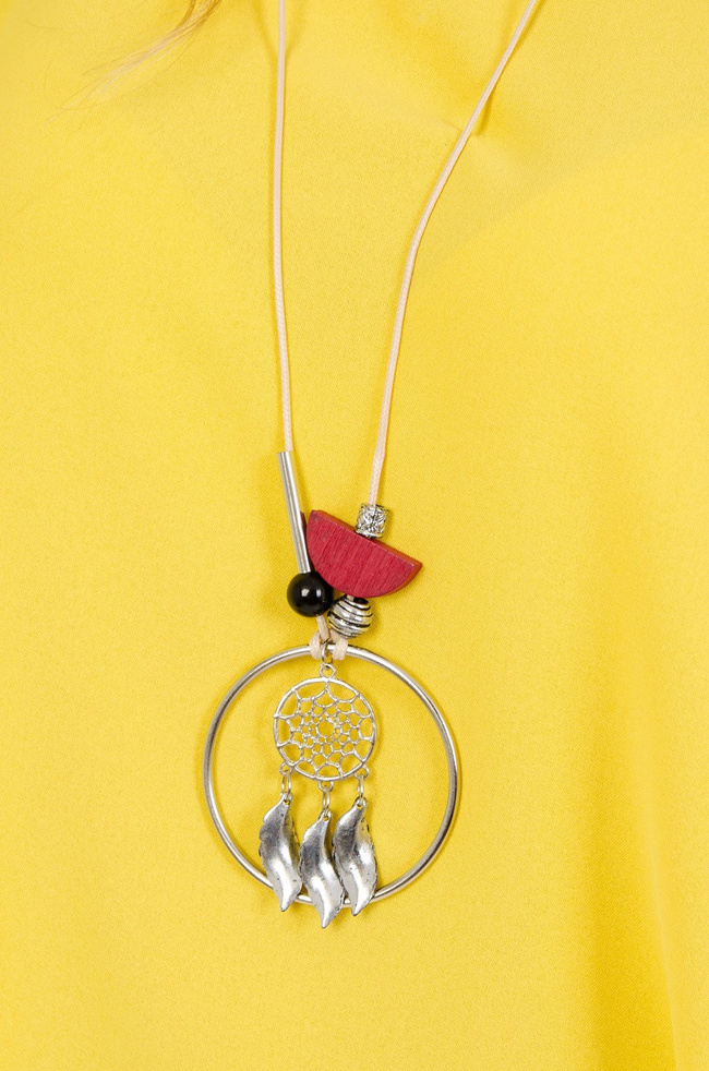 Żółta bluzka z guzikami na plecach