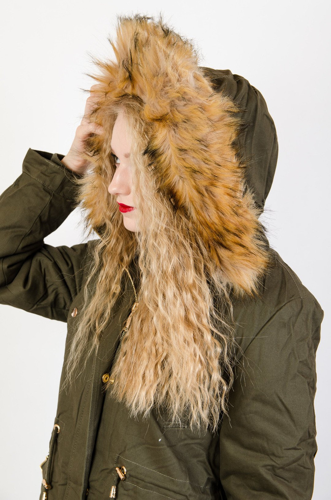 Zielona asymetryczna kurtka ze ściągaczem w pasie