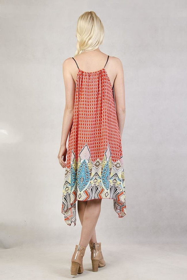 Wzorzysta sukienka z dłuższymi bokami pomarańczowa