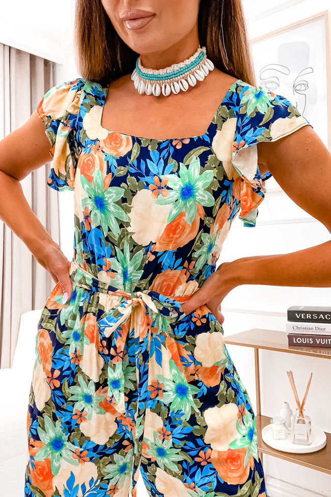 KOMBINEZON W KWIATY Z PASKIEM- GRANATOWY