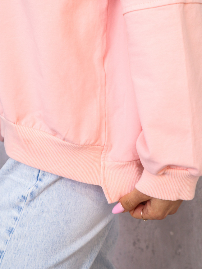 ASYMETRYCZNA BLUZA OVERSIZE Z PRZESZYCIAMI NA RĘKAWACH- JASNY ROŻ