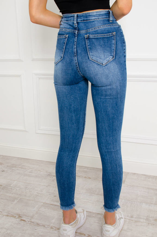 SPODNIE JEANSOWE SKINNY Z PRZETARCIAMI NA DOLE NOGAWKI- WYSOKI STAN