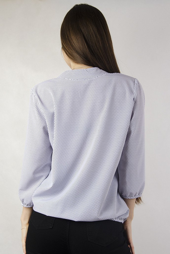 Biała bluzka w czarne kropki