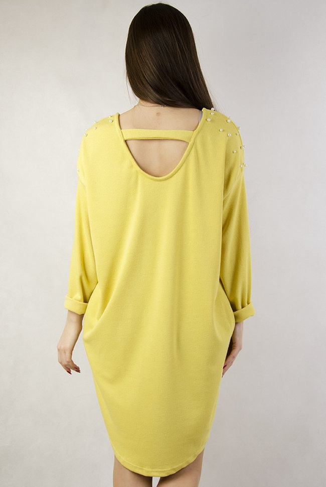 Żółta asymetryczna tunika z perełkami oraz wycięciem na plecach