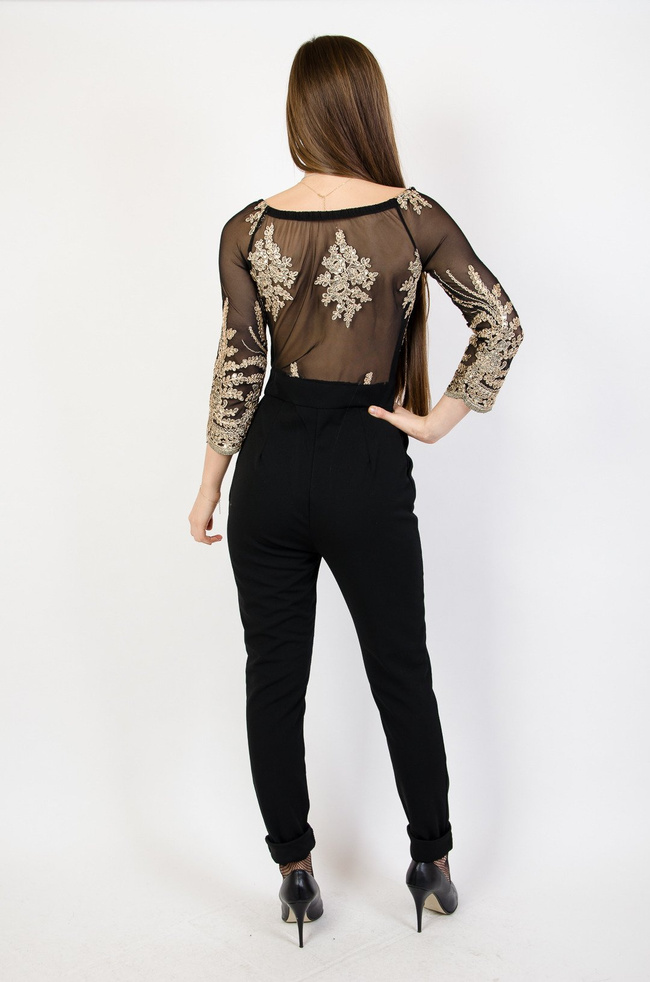 Czarny elegancki kombinezon ze złotymi cekinami 