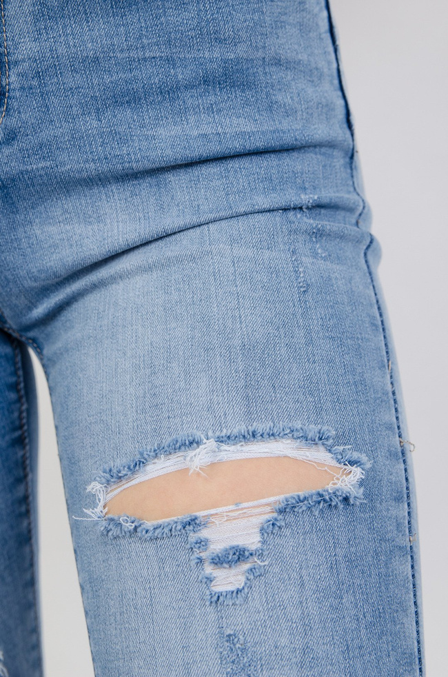Jasne spodnie jeansowe Push up z przetarciami