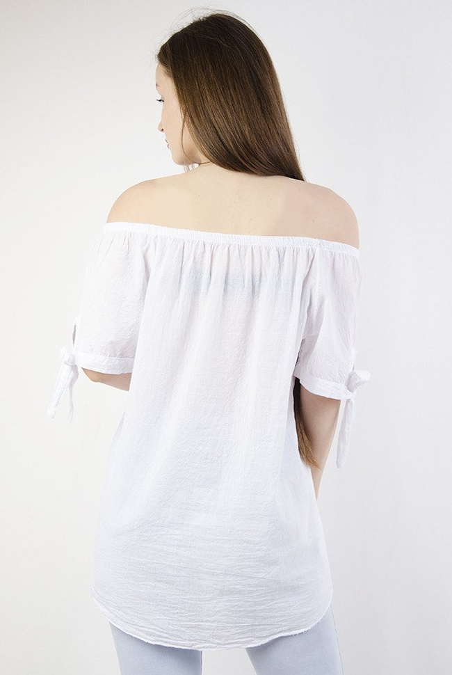 Biała bluzka ze wzorami na dole