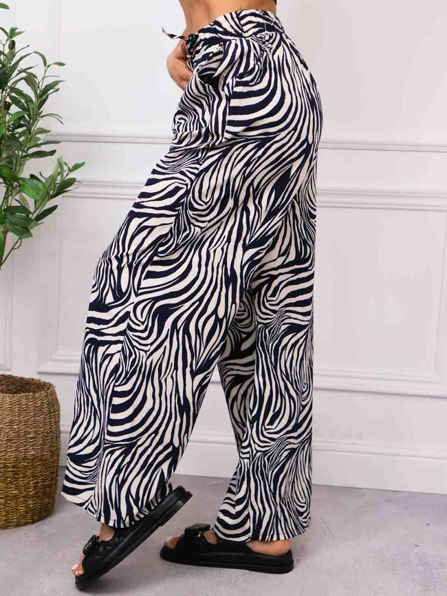 SPODNIE W ZEBRĘ Z SZEROKIMI NOGAWKAMI- GRANATOWY