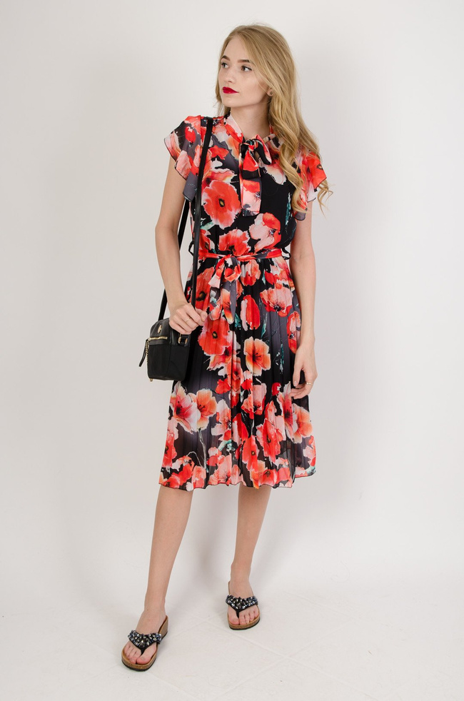 Czarna sukienka w maki z plisowanym dołem