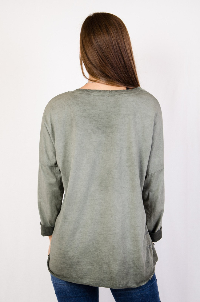 Zielona bluzka z aplikacjami