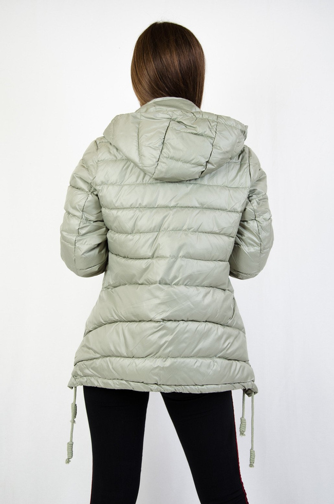 Zielona pikowana kurtka z asymetrycznymi bokami