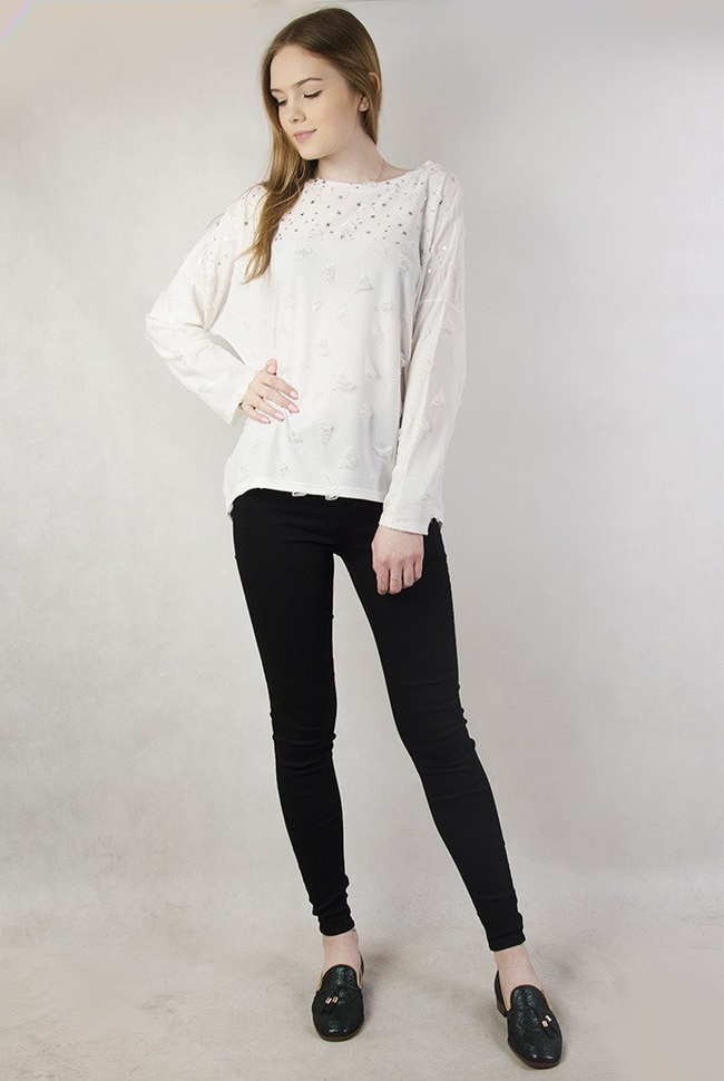 Czarne spodnie jeansowe z guzikami po bokach