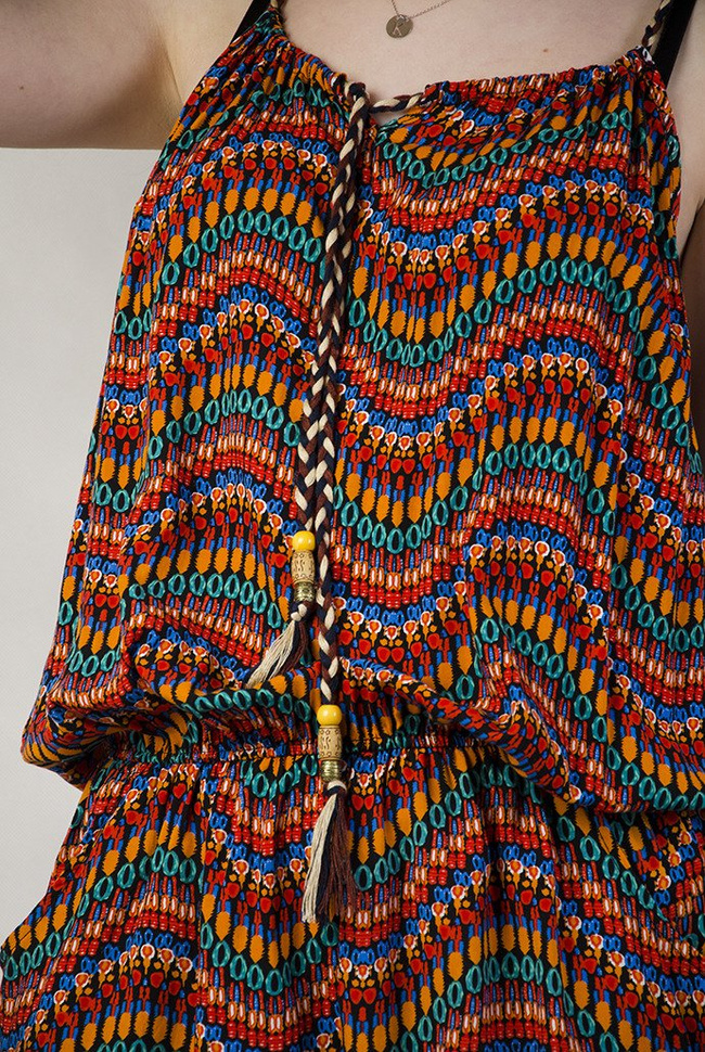 Kombinezon w kolorowe wzorki