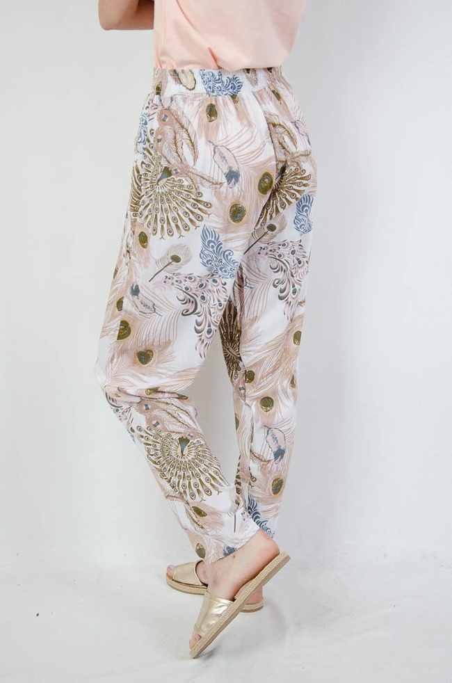 Białe spodnie alladynki z motywem pawiego oka