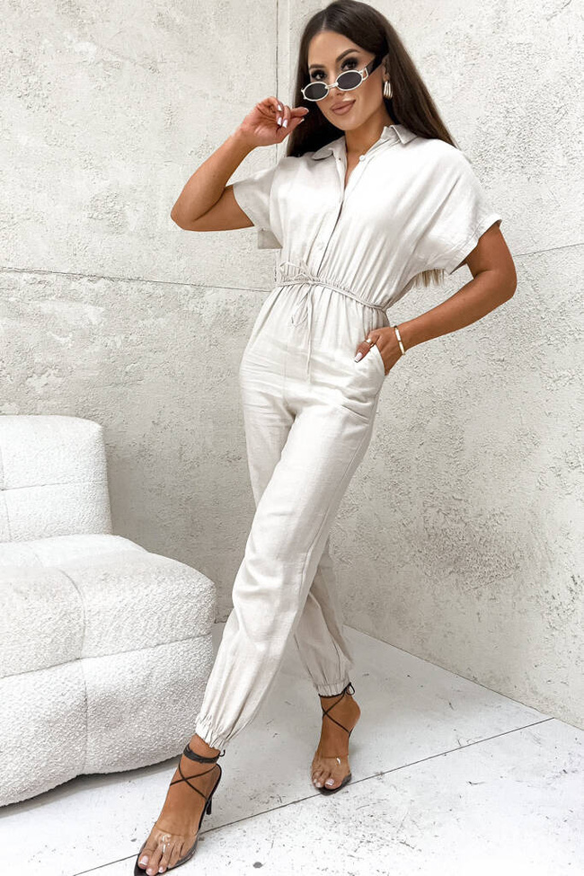 KOMBINEZON Z GUZIKAMI I GUMKĄ W PASIE- BEŻOWY