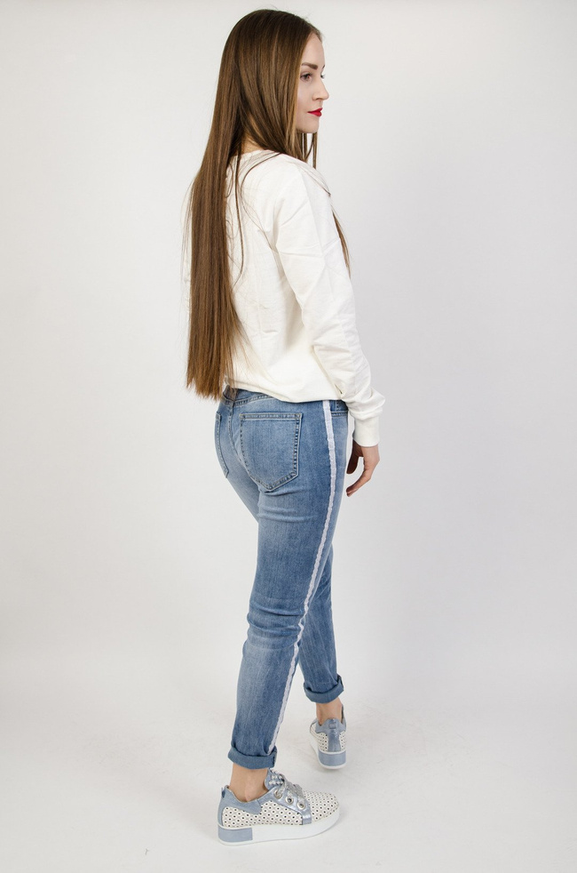 Jasne spodnie jeansowe z lampasem i gumką w pasie