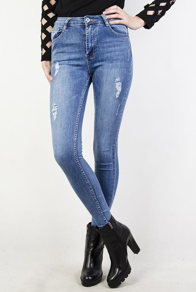 Jeansowe spodnie skinny jeans z przetarciami oraz wysokim stanem