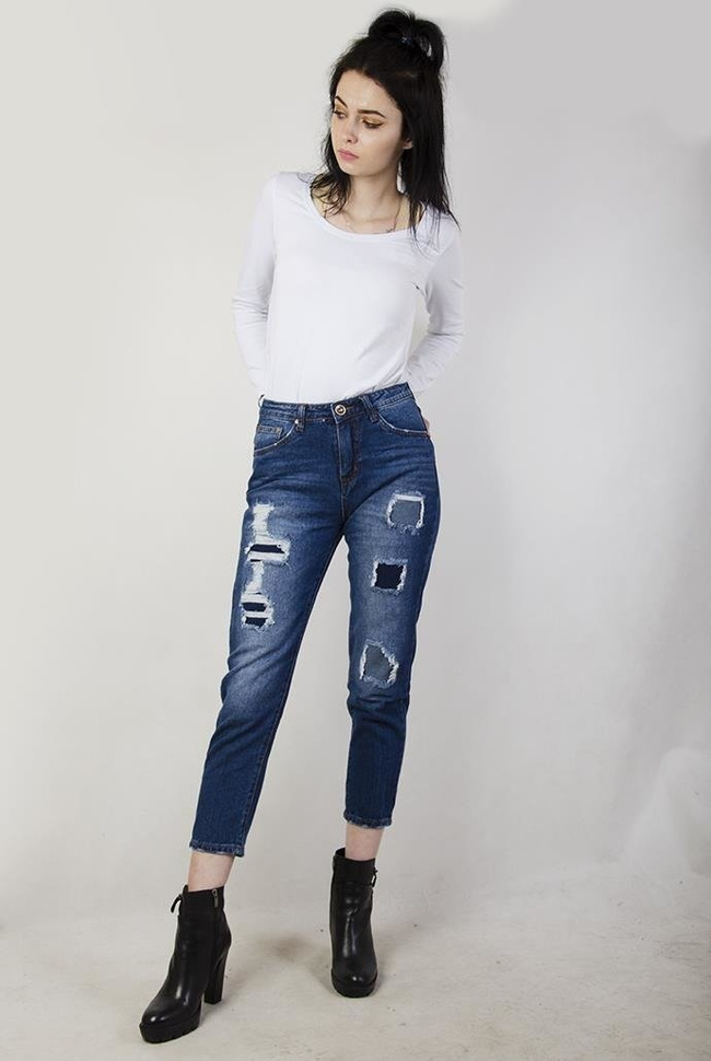Spodnie jeansowe typu mom jeans z dziurami