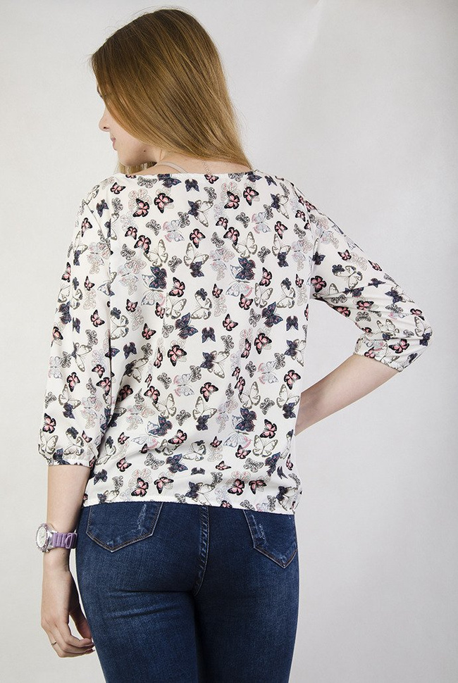 Biała, gładka bluzka w motyle