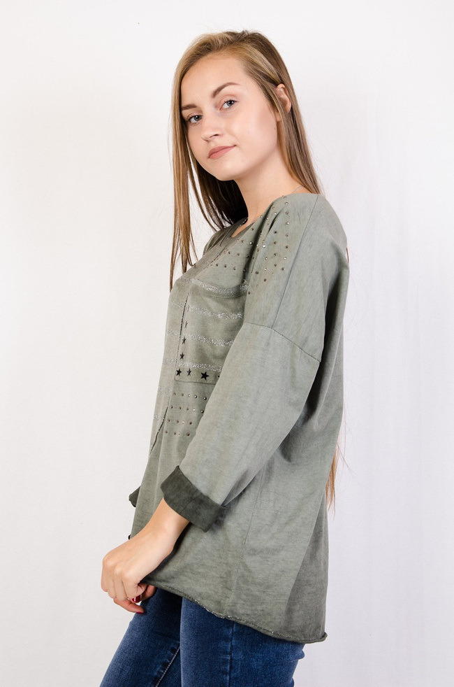 Zielona bluzka z aplikacjami