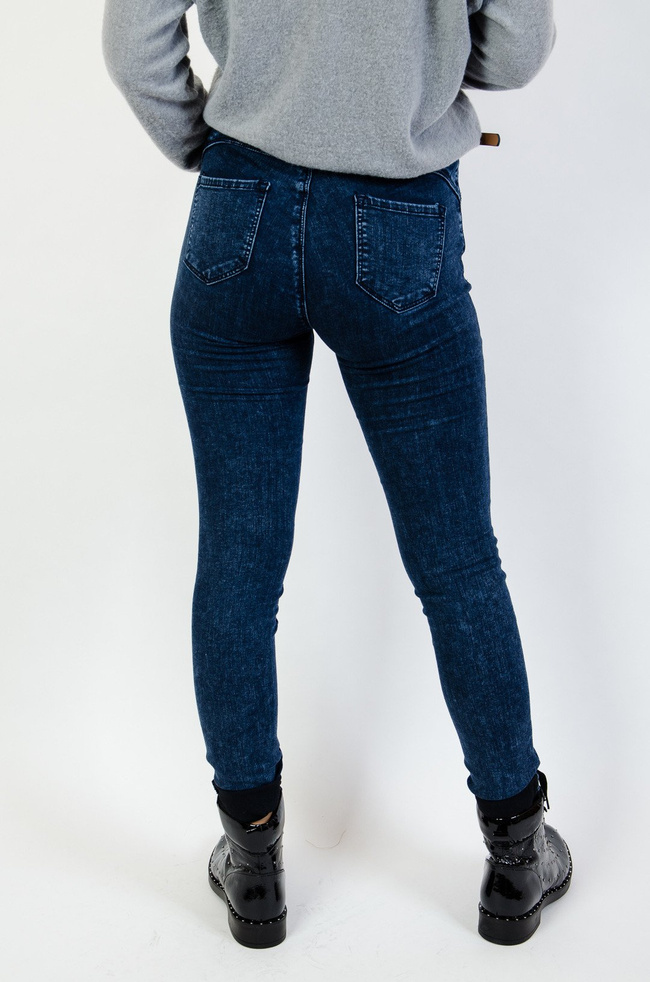 Spodnie skinny z wysokim stanem oraz falbaną w pasie