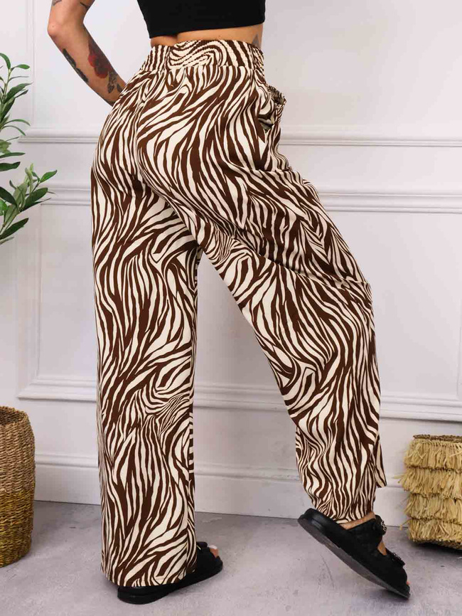 SPODNIE W ZEBRĘ Z SZEROKIMI NOGAWKAMI- BRĄZOWY